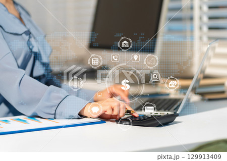 Businesswoman analyzing business enterprise data management, business analytics with charts. 129913409