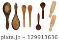 Collection of different wooden spoons, measuring scoop, spatulas, front and back top view. Isolated on white background 129913636