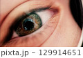 Close up macro kid eye with big retina, wearing glasses 129914651