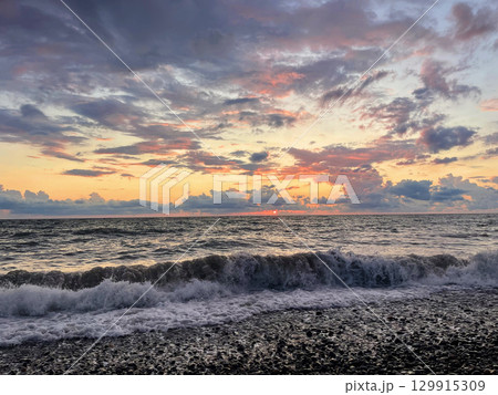 Colorful landscape with sea sunset on beach Colorful landscape with sea sunset on beach 129915309