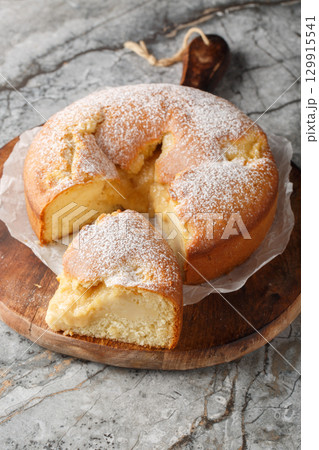 Italian Custard Cake Torta Nua closeup on the wooden board. Vertical 129915541