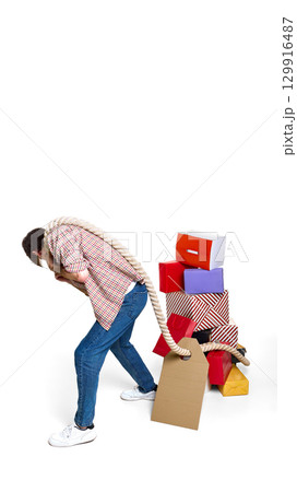 Man dragging rope with pile of shopping boxes...の写真素材 [129916487] - PIXTA