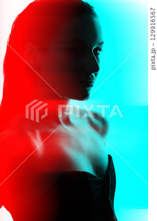 Beautiful woman with corset and wet hair studio portrait in RGB color split effect style Beautiful woman with corset and wet hair studio portrait in RGB color split effect style 129916567