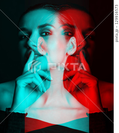 Beautiful woman with dark hair and blouse close-up studio portrait in RGB color split effect style Beautiful woman with dark hair and blouse close-up studio portrait in RGB color split effect style 129916573