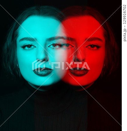 Beautiful woman with make-up and lipstick close-up studio portrait in RGB color split effect style Beautiful woman with make-up and lipstick close-up studio portrait in RGB color split effect style 129916702