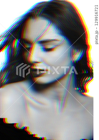 Beautiful woman with long wavy flying hair sensual studio portrait in RGB color split effect style 129916721