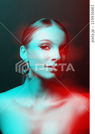 Woman portrait with classic hairstyle, naked shoulders and round earrings in RGB color split effect style 129916861