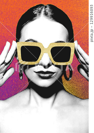 Woman portrait with classic hairstyle and golden retro sunglasses 129916893