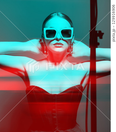 Woman portrait with classic hairstyle, retro sunglasses, lipstick, round earrings and black corset in RGB color split effect style 129916906