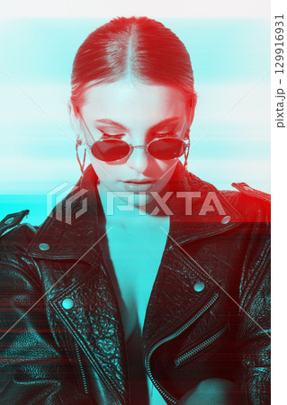 Woman studio portrait with black punk leather jacket, sunglasses and without bra in RGB color split effect style Woman studio portrait with black punk leather jacket, sunglasses and without bra in RGB color split effect style 129916931