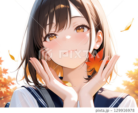 セーラー服の女子高生と秋の季節感あふれる青春と紅葉の通学シーン 129916978
