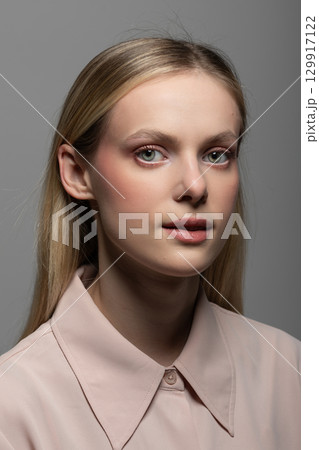 Beautiful woman classic close-up studio portrait 129917122