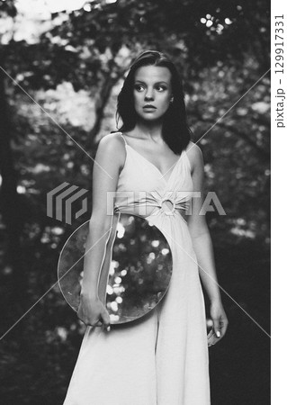 Mystical Forest Woman Portrait with Mirror Glass Sphere 129917331