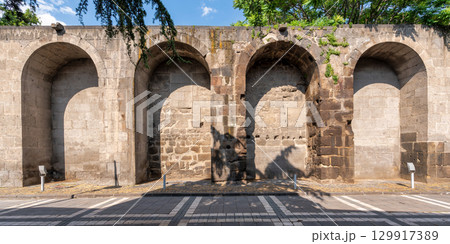 Sunlight and shadows on ancient stone wall arches of Kayseri Castle, Kayseri, Turkey Sunlight and shadows on ancient stone wall arches of Kayseri Castle, Kayseri, Turkey 129917389