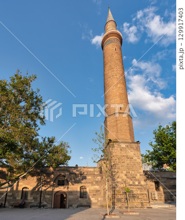 Historic Ulu Cami, aka Great Mosque minaret in Kayseri, Turkey under a clear blue sky Historic Ulu Cami, aka Great Mosque minaret in Kayseri, Turkey under a clear blue sky 129917403