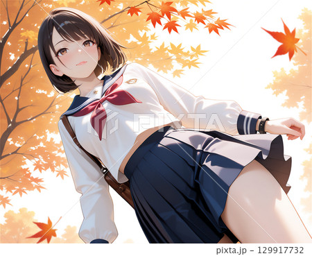 セーラー服の女子高生と秋の季節感あふれる青春と紅葉の通学シーン 129917732