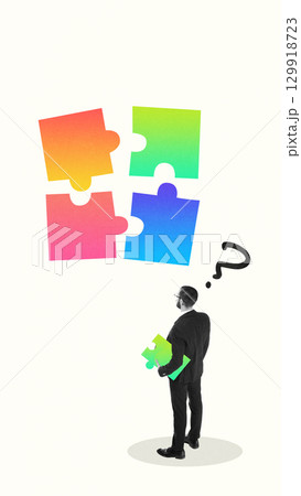 Trendy collage with businessman holding puzzle piece facing floating colorful puzzle 129918723