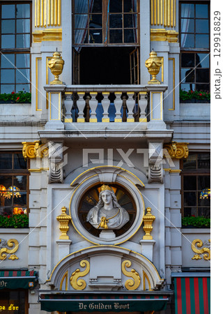 Lavishly decorated facades and architectural details of Guildhalls on the Grand-Place Grote Markt square of Brussels, Belgium Lavishly decorated facades and architectural details of Guildhalls on the Grand-Place Grote Markt square of Brussels, Belgium 129918829