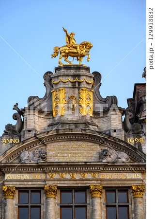Lavishly decorated facades and architectural details of Guildhalls on the Grand-Place Grote Markt square of Brussels, Belgium Lavishly decorated facades and architectural details of Guildhalls on the Grand-Place Grote Markt square of Brussels, Belgium 129918832
