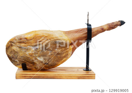 Whole jamon on a wooden stand Whole jamon on a wooden stand 129919005