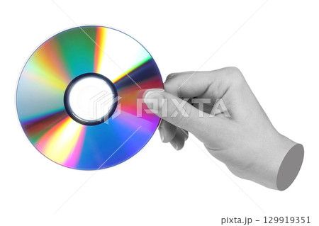 Hand holds cd compact disk, isolated on transparent background, retro teachnology concept. Contemporary art design Hand holds cd compact disk, isolated on transparent background, retro teachnology concept. Contemporary art design 129919351
