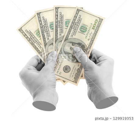 Hand holds US dollars cash bills, isolated on transparent background, business concept. Contemporary art design Hand holds US dollars cash bills, isolated on transparent background, business concept. Contemporary art design 129919353