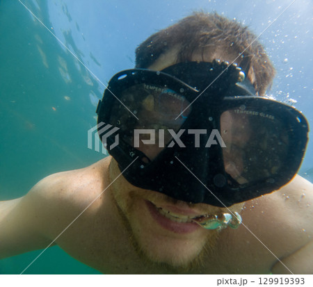 Happy Snorkeler Underwater taking Selfie Happy Snorkeler Underwater taking Selfie 129919393