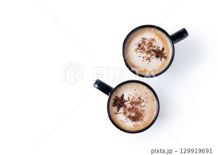 Chai Latte in Black Mug with cinnamon and star anise 129919691