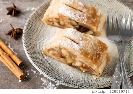 Homemade apple strudel slices Homemade apple strudel slices 129919715