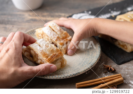 Homemade apple strudel slices Homemade apple strudel slices 129919722