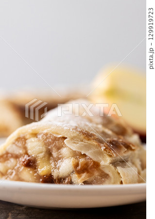 Homemade apple strudel slices Homemade apple strudel slices 129919723