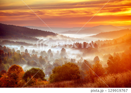 Morning mountain landscape, autumn seasonal background, amazing sunrise Morning mountain landscape, autumn seasonal background, amazing sunrise 129919767