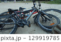 Two bikes on a beach 129919785