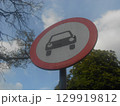 A road sign with a car 129919812