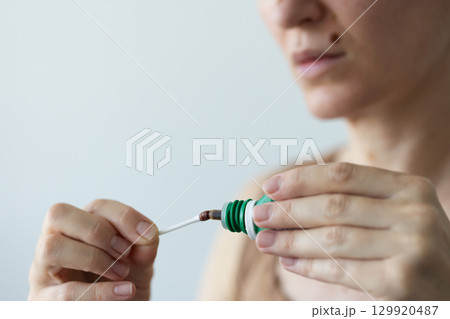 Treatment of wounds after removal of the moles with betacine Closeup. 129920487