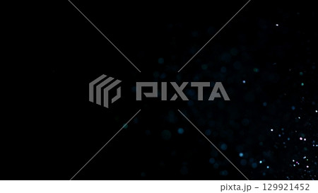Freeze Motion Shot of Color Glitter Background Isolated on Black 129921452