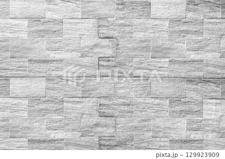 Light gray stone wall texture, Horizontal architecture wallpaper. 129923909