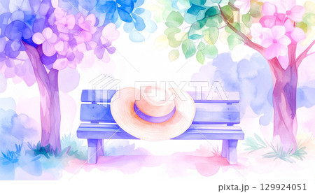 夏の日差しと木陰のベンチに置かれた麦わら帽子の水彩画 129924051