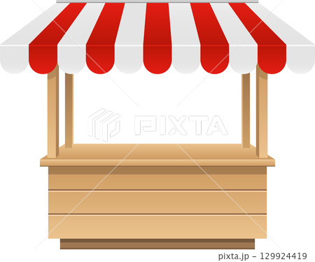 Empty marketplace stall with a red and white striped canopy, ready for merchants and shoppers. 129924419