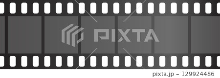 Blank film strip with empty frames for photography or cinematic visuals in gray scale. 129924486