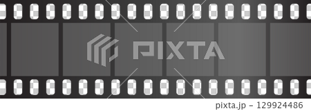 Blank film strip with empty frames for photography or cinematic visuals in gray scale. 129924486
