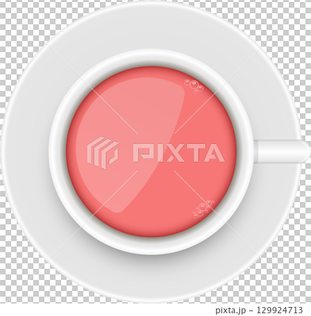Overhead view of a pink beverage in a white cup on a saucer with small bubbles visible. 129924713