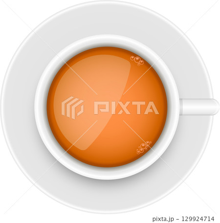 Overhead shot of a steaming cup on a saucer. A glossy, warm beverage ready to be enjoyed. 129924714