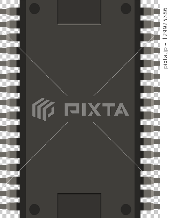 Isolated overhead shot of a microcontroller with pins displayed against black backdrop. 129925386