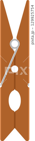 Detailed image of a traditional brown wood clothespin with silver spring isolated against a black backdrop. 129925754