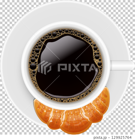 Overhead view of fresh brewed coffee in white cup and croissant pastry, warm breakfast vibes. 129925764