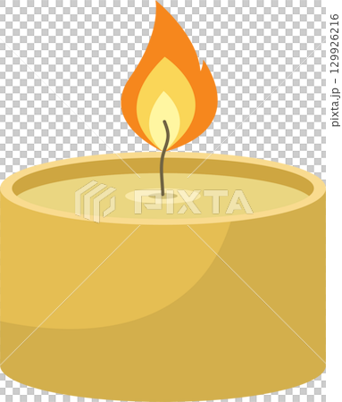 A warm glow emanates from the lit candle, its gentle flame dancing in the still, quiet air. 129926216