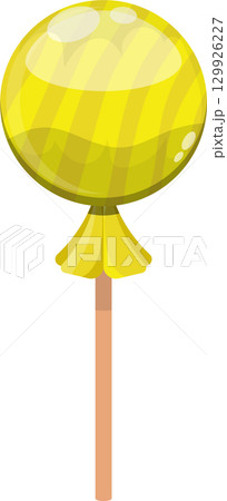 A delightful yellow lollipop with a rounded head and brown stick against a stark black background. A delightful yellow lollipop with a rounded head and brown stick against a stark black background. 129926227