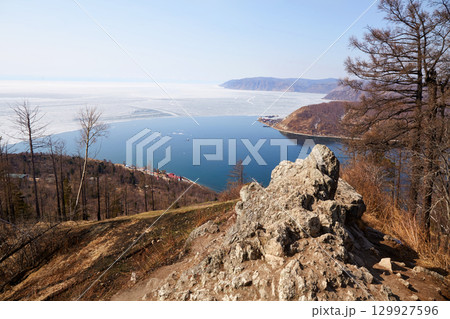 A popular view of the source of the Angara River on Lake Baikal 129927596