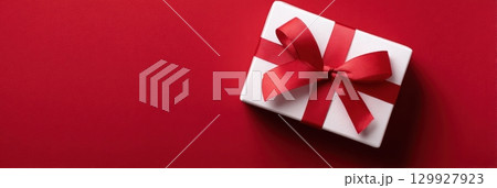 Happy Valentines day template with gift box. Romantic design decorative objects, red heart. Sale long banner, surprise poster, flyer and brochure. Mock up holiday. Front view. 3D. Panoramic 129927923